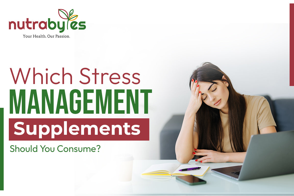 Stressed woman at desk with laptop and notebook, under text 'Which Stress Management Supplements Should You Consume?